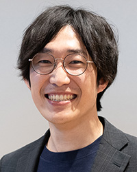 田村 佳士 氏