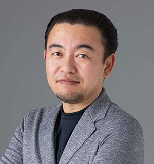 ⼩栗 伸 氏